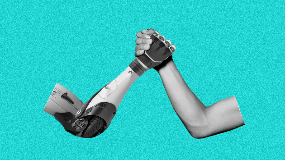 A human and a robot arm hands